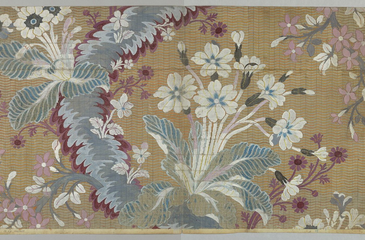 Woven floral brocade textile with a metallic ground
