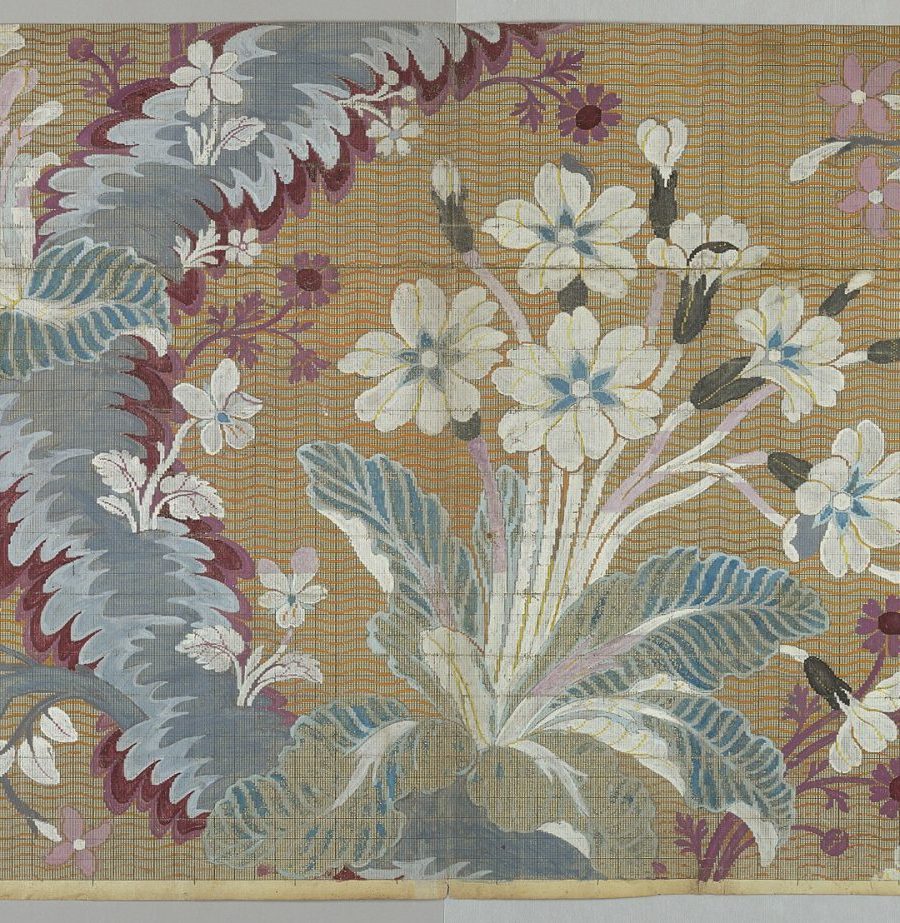 Woven floral brocade textile with a metallic ground